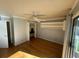 Bedroom with hardwood floors and built in shelves at 61 Twin Oaks Ln, Isle of Palms, SC 29451