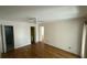 Spacious bedroom with hardwood floors and ceiling fan at 61 Twin Oaks Ln, Isle of Palms, SC 29451