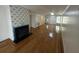 Living room with hardwood floors and fireplace at 61 Twin Oaks Ln, Isle of Palms, SC 29451