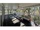 Relaxing screened porch with wooded views at 61 Twin Oaks Ln, Isle of Palms, SC 29451