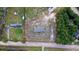Aerial view showing manufactured home on a lot with surrounding trees at 68 Kickback Cv, Round O, SC 29474