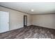 Spacious bedroom with wood-look floors and ample natural light at 68 Kickback Cv, Round O, SC 29474