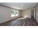 Bedroom with wood-look floors and access to a hallway bathroom at 68 Kickback Cv, Round O, SC 29474