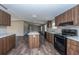Open concept kitchen with island and stainless steel appliances at 68 Kickback Cv, Round O, SC 29474