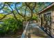 Spacious deck overlooking lush landscaping and mature trees at 7 Dunecrest Trace, Seabrook Island, SC 29455