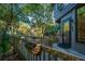 Small deck with access to the home and a view of the neighborhood at 7 Dunecrest Trace, Seabrook Island, SC 29455