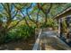 Spacious deck overlooking lush landscaping and mature trees at 7 Dunecrest Trace, Seabrook Island, SC 29455