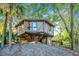 Unique treehouse home nestled amongst the trees, offering a secluded and peaceful setting at 7 Dunecrest Trace, Seabrook Island, SC 29455