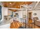Open kitchen boasts granite countertops, white cabinets, and stainless steel appliances at 7 Dunecrest Trace, Seabrook Island, SC 29455