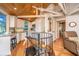 Bright, galley-style kitchen with white cabinets and stainless steel appliances at 7 Dunecrest Trace, Seabrook Island, SC 29455