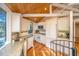 Bright kitchen features granite countertops, white cabinets, and modern appliances at 7 Dunecrest Trace, Seabrook Island, SC 29455