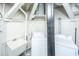 Basement laundry room with washer, dryer, and utility sink at 7 Dunecrest Trace, Seabrook Island, SC 29455