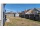 Backyard with storage shed and wooden fence at 7315 Coopers Hawk Dr, Hanahan, SC 29410