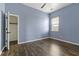 Light-filled bedroom with hardwood floors and a closet at 7315 Coopers Hawk Dr, Hanahan, SC 29410