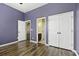 Spacious bedroom with hardwood floors and ample closet space at 7315 Coopers Hawk Dr, Hanahan, SC 29410