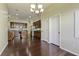 Spacious dining room with hardwood floors and kitchen views at 7315 Coopers Hawk Dr, Hanahan, SC 29410