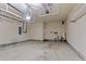 Spacious garage with overhead storage and utility area at 7315 Coopers Hawk Dr, Hanahan, SC 29410