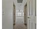Bright hallway with carpet flooring and access to bedrooms at 7315 Coopers Hawk Dr, Hanahan, SC 29410