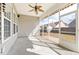 Spacious screened porch with ceiling fan and view of backyard at 7315 Coopers Hawk Dr, Hanahan, SC 29410