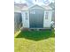 Gray and white storage shed in the backyard at 7315 Coopers Hawk Dr, Hanahan, SC 29410