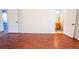Bedroom with wood-look floors and access to bathroom at 8419 Creekstone Ct, North Charleston, SC 29406