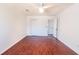 Large bedroom with wood-look floors, and ceiling fan at 8419 Creekstone Ct, North Charleston, SC 29406