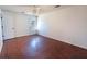 Bright bedroom with wood-look flooring and ceiling fan at 8419 Creekstone Ct, North Charleston, SC 29406