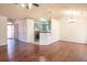 Open concept dining room with hardwood floors and kitchen access at 8419 Creekstone Ct, North Charleston, SC 29406