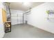Garage with storage shelving and overhead door at 8419 Creekstone Ct, North Charleston, SC 29406