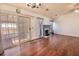 Living room with fireplace, hardwood floors, and sliding glass doors at 8419 Creekstone Ct, North Charleston, SC 29406