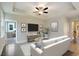 Bright living room with hardwood floors, comfy couch, and a TV at 8625 Connor Ct, North Charleston, SC 29406