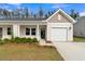 Craftsman style home with attached garage and manicured landscaping at 962 Dusk Dr, Summerville, SC 29486