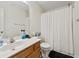 Clean bathroom with a shower/tub combo and wood vanity at 9632 Scarborough Ct, Summerville, SC 29485