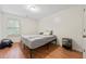 Bright bedroom with wood floors and a window at 9632 Scarborough Ct, Summerville, SC 29485