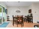 Bright dining room with table and chairs, and access to a patio at 9632 Scarborough Ct, Summerville, SC 29485