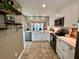 Modern kitchen with white cabinets and quartz countertops at 1126 Shadow Lake Circle # 58, Mount Pleasant, SC 29464