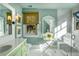Spa-like bathroom with a glass shower, and light green vanity at 119 Halona Ln, Kiawah Island, SC 29455