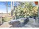 Relaxing deck with wicker furniture offers peaceful marsh views at 119 Halona Ln, Kiawah Island, SC 29455