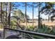 Deck overlooks peaceful marsh scenery and lush vegetation at 119 Halona Ln, Kiawah Island, SC 29455