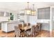 Kitchen dining area with hardwood floors and a wood table at 119 Halona Ln, Kiawah Island, SC 29455