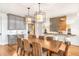 Bright dining room featuring a large wooden table and wicker chairs at 119 Halona Ln, Kiawah Island, SC 29455