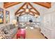Bright loft area with a desk, seating area, and high ceilings at 119 Halona Ln, Kiawah Island, SC 29455