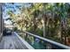Linear pool with wooden deck and lush tropical landscaping at 119 Halona Ln, Kiawah Island, SC 29455