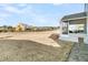 Large backyard with a screened porch and partial view of the neighborhood at 119 Leeward Lndg, Summerville, SC 29486