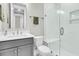 Clean bathroom with walk-in shower and gray vanity at 119 Leeward Lndg, Summerville, SC 29486