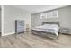 Spacious bedroom with hardwood floors, ample light, and wooden bed frame at 119 Leeward Lndg, Summerville, SC 29486