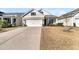 Two-story Craftsman home with a large driveway and landscaped yard at 119 Leeward Lndg, Summerville, SC 29486