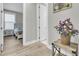 Bright hallway with hardwood floors and simple decor at 119 Leeward Lndg, Summerville, SC 29486