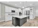 Modern kitchen with stainless steel appliances and large island at 119 Leeward Lndg, Summerville, SC 29486