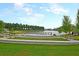 Scenic community lake with a gazebo and seating at 119 Leeward Lndg, Summerville, SC 29486
